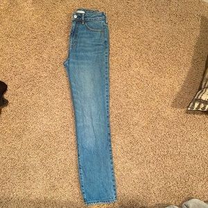 straight leg, blue jeans with no rips form Pacsun.